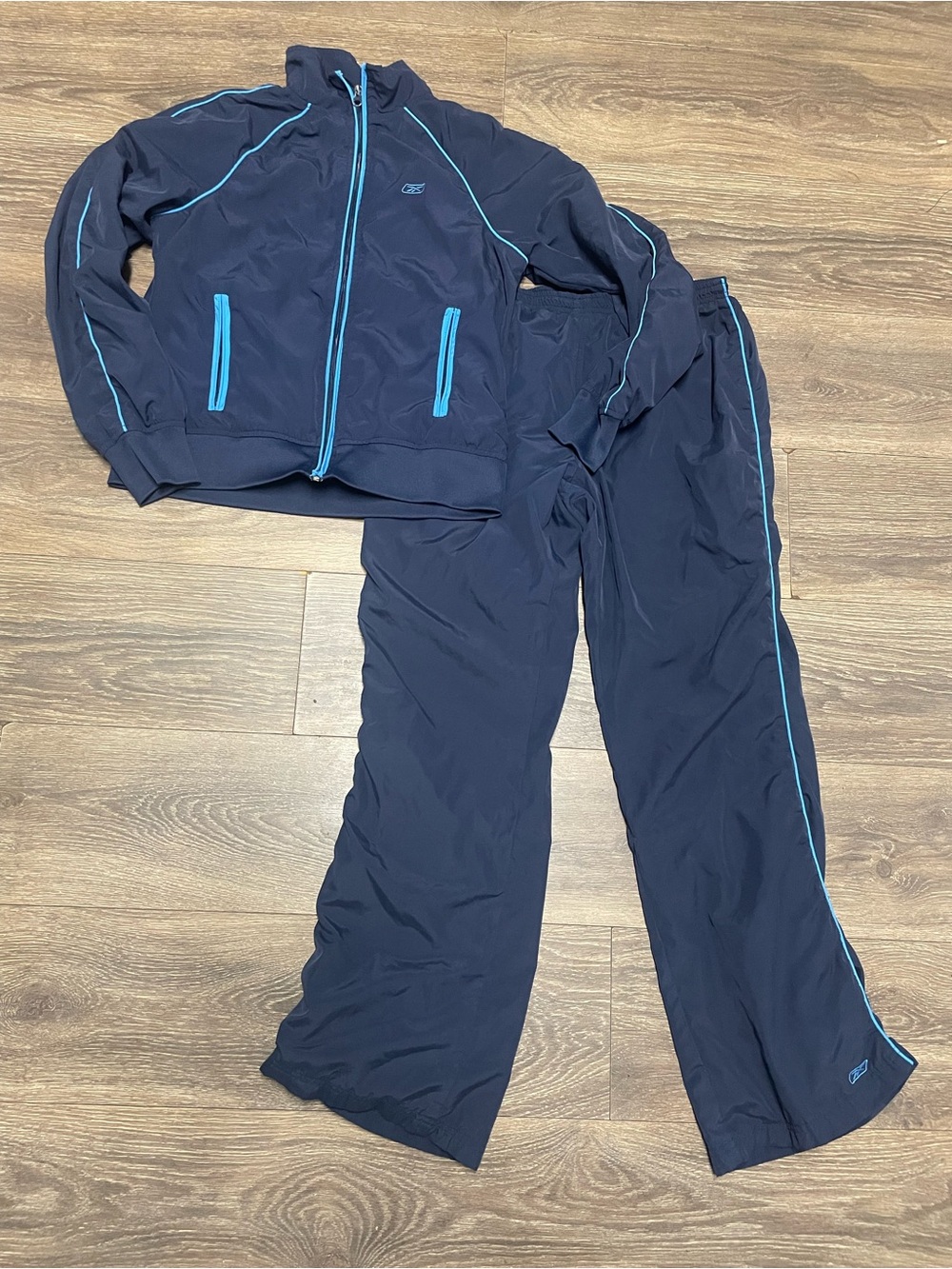 Reebok blue tracksuit features contrasting light blue piping pants jacket Large